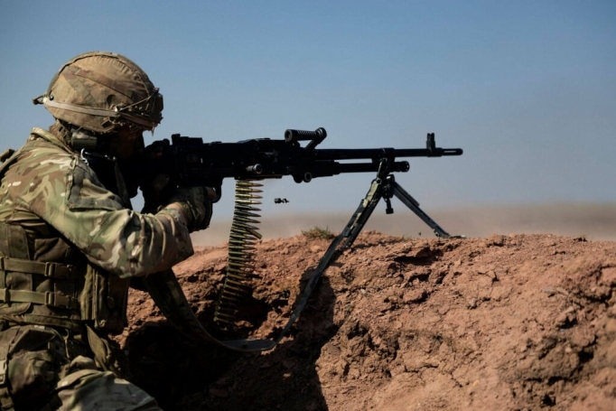 Soldier manning machine gun